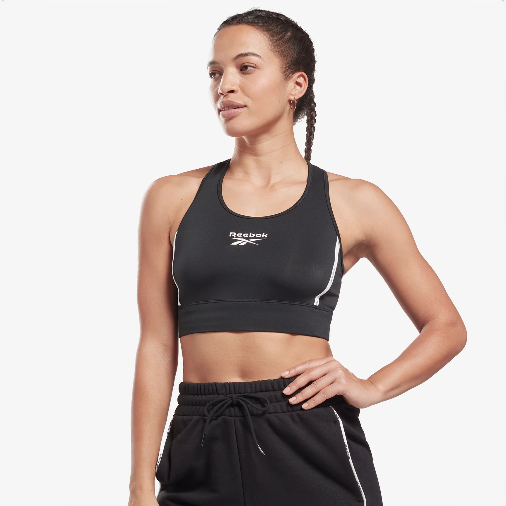 TOP REEBOK PIPING - MEDIUM IMPACT